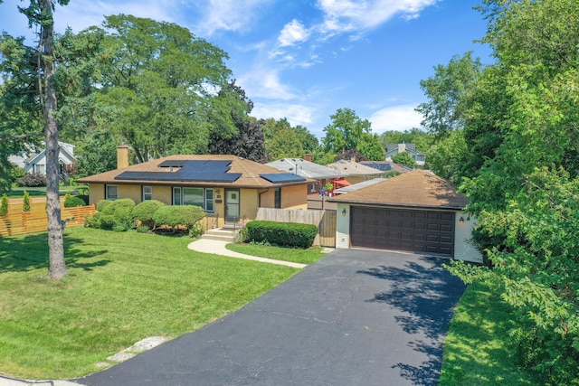128 8th St, Downers Grove, IL 60515 - ranch-style home featuring a chimney, roof mounted solar panels, and a garage