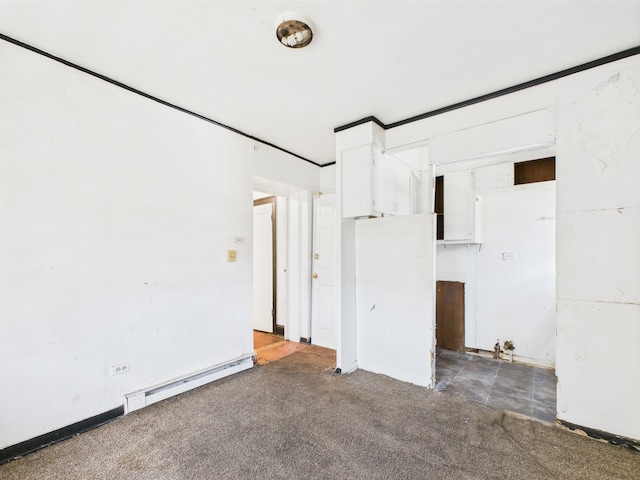8237 S Ada St, Chicago, IL 60620 - unfurnished bedroom featuring a baseboard heating unit and carpet floors