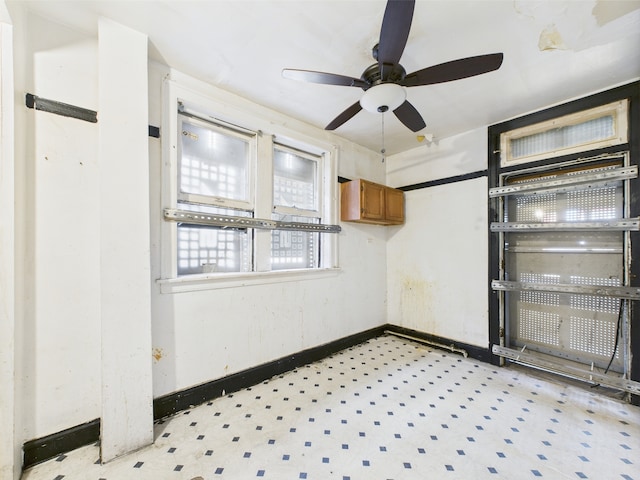 8237 S Ada St, Chicago, IL 60620 - empty room featuring light flooring, baseboards, and ceiling fan