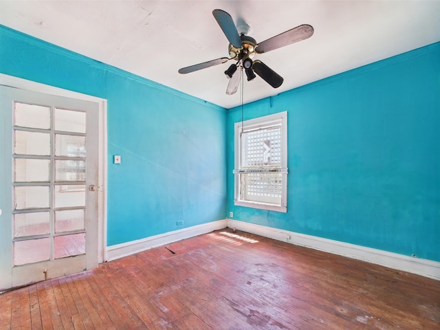 8237 S Ada St, Chicago, IL 60620 - spare room with wood-type flooring, baseboards, and a ceiling fan