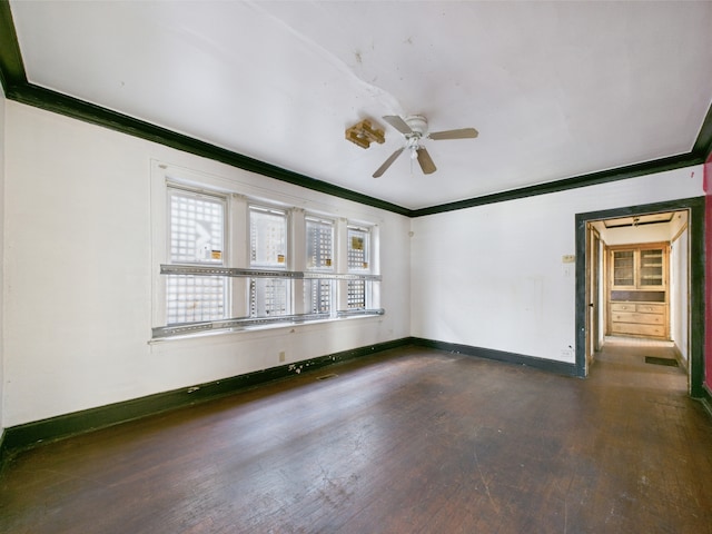 8237 S Ada St, Chicago, IL 60620 - unfurnished room with crown molding, wood finished floors, baseboards, and a ceiling fan