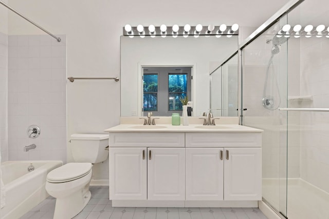 1947 W Evergreen Ave Unit A, Chicago, IL 60622 - full bath featuring tile patterned floors, double vanity, toilet, and enclosed tub / shower combo