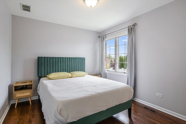 4647 N Thatcher Ave, Norridge, IL 60706 - bedroom featuring wood finished floors and baseboards