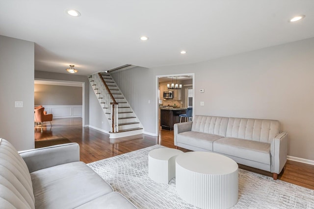 4647 N Thatcher Ave, Norridge, IL 60706 - living area with wood finished floors, stairs, recessed lighting, a chandelier, and baseboards