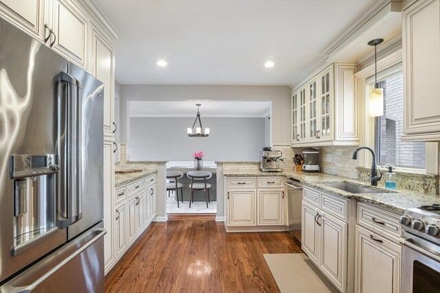 4647 N Thatcher Ave, Norridge, IL 60706 - kitchen featuring appliances with stainless steel finishes, a sink, dark wood-style floors, backsplash, and glass insert cabinets