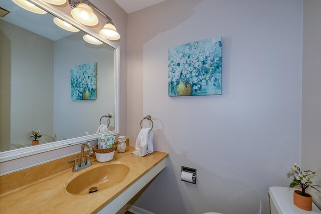 911 Woodland Hills Rd, Batavia, IL 60510 - bathroom featuring toilet and vanity