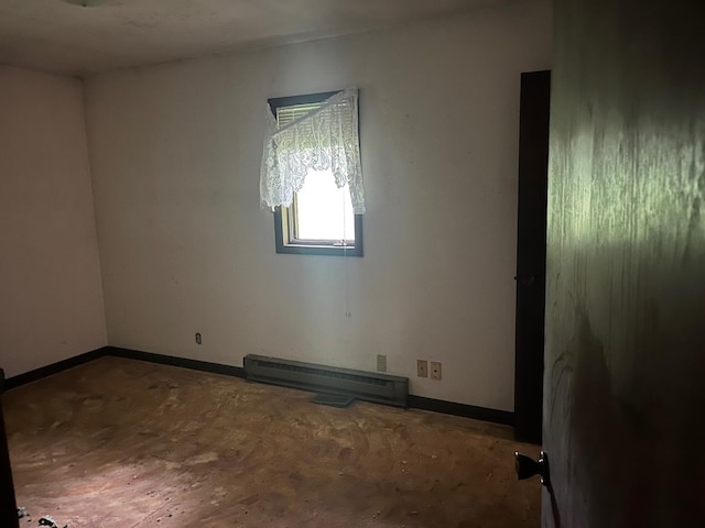 4528 1369th Rd, Earlville, IL 60518 - empty room featuring a baseboard heating unit and baseboards