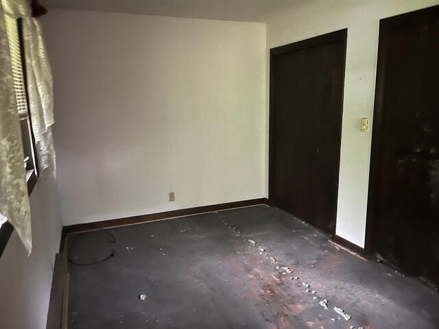 4528 1369th Rd, Earlville, IL 60518 - unfurnished bedroom featuring baseboards