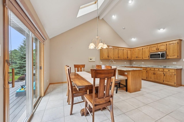 22178 Chamomile Dr, Frankfort, IL 60423 - dining space with a skylight, beamed ceiling, high vaulted ceiling, a chandelier, and light tile patterned flooring