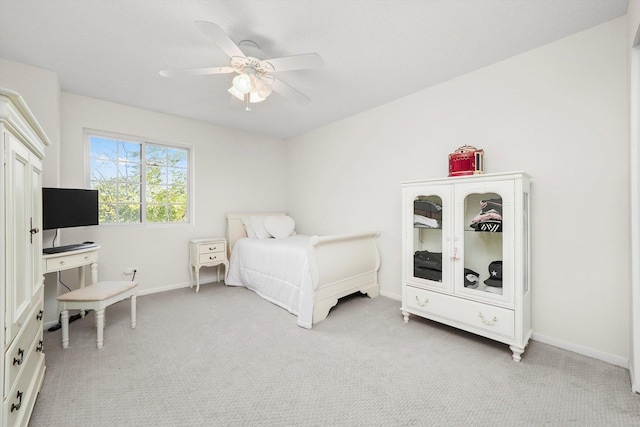 2569 Essex Dr, Northbrook, IL 60062 - bedroom featuring light carpet, baseboards, and a ceiling fan