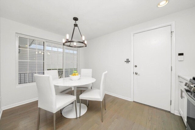 2569 Essex Dr, Northbrook, IL 60062 - dining room featuring a chandelier, wood finished floors, recessed lighting, and baseboards