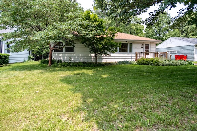1700 W William St, Champaign, IL 61821 - view of front of house with a front lawn
