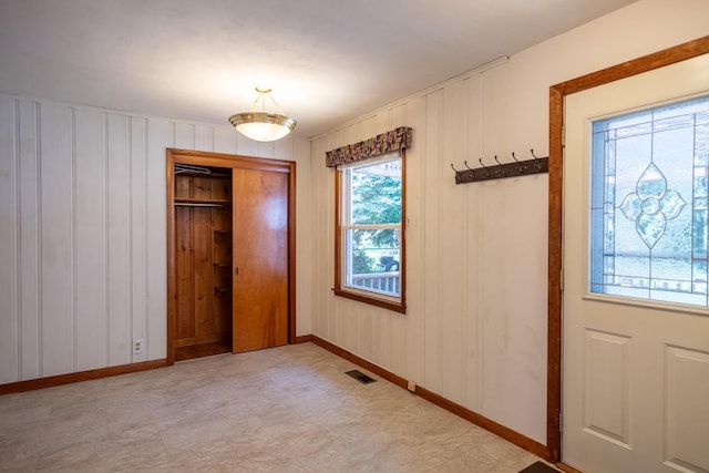 1700 W William St, Champaign, IL 61821 - entrance foyer featuring baseboards and light floors