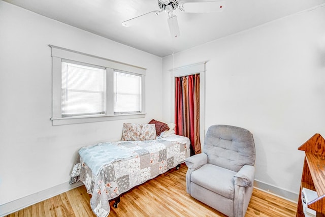 629 S Union St, Aurora, IL 60505 - bedroom featuring wood finished floors, baseboards, and ceiling fan