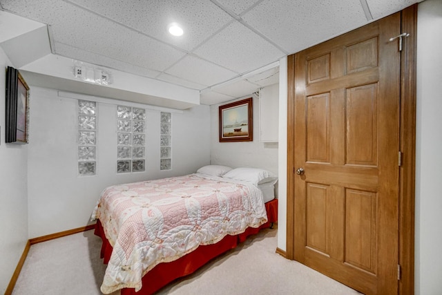 629 S Union St, Aurora, IL 60505 - carpeted bedroom featuring a drop ceiling and baseboards