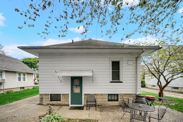 629 S Union St, Aurora, IL 60505 - rear view of house with a patio