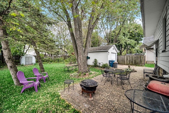 629 S Union St, Aurora, IL 60505 - view of yard featuring an outdoor fire pit, a patio, and outdoor dining area
