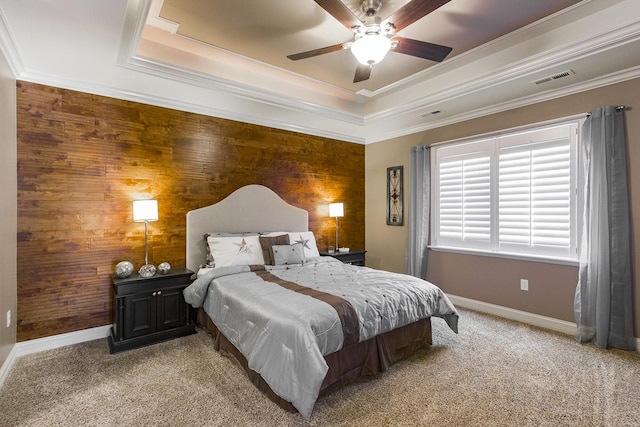2164 Waterbury Ln W Unit 2164, Sycamore, IL 60178 - bedroom featuring wooden walls, a tray ceiling, light carpet, baseboards, and ornamental molding