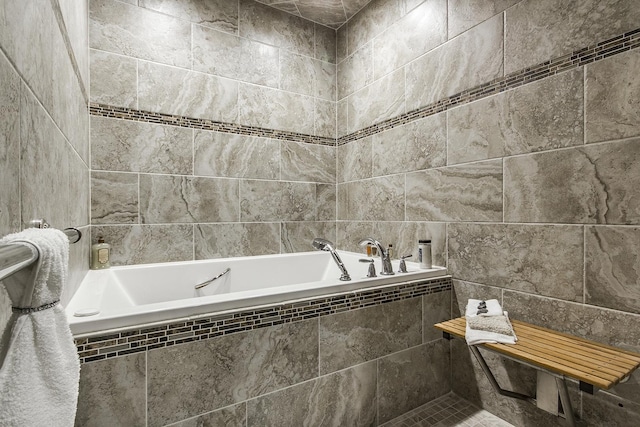 2164 Waterbury Ln W Unit 2164, Sycamore, IL 60178 - bathroom featuring a garden tub and tile walls