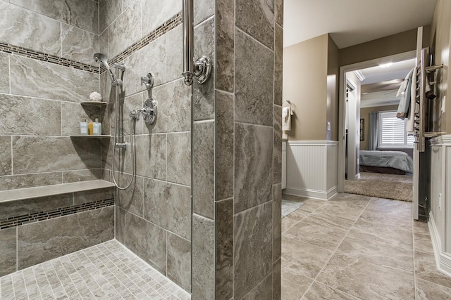 2164 Waterbury Ln W Unit 2164, Sycamore, IL 60178 - full bath featuring tiled shower, ensuite bath, and wainscoting