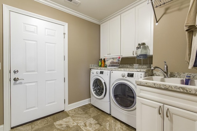 2164 Waterbury Ln W Unit 2164, Sycamore, IL 60178 - laundry room with separate washer and dryer, cabinet space, ornamental molding, and baseboards