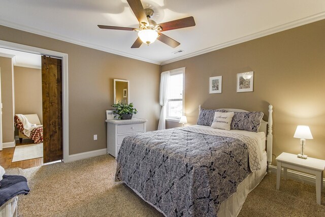 2164 Waterbury Ln W Unit 2164, Sycamore, IL 60178 - carpeted bedroom with ornamental molding, baseboards, and ceiling fan