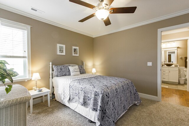 2164 Waterbury Ln W Unit 2164, Sycamore, IL 60178 - bedroom with multiple windows, light colored carpet, ornamental molding, baseboards, and a ceiling fan