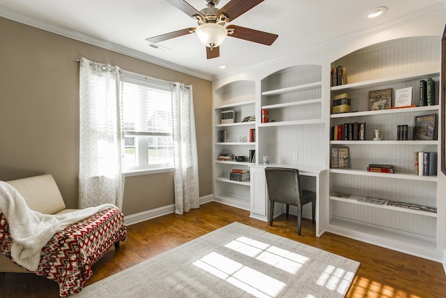 2164 Waterbury Ln W Unit 2164, Sycamore, IL 60178 - sitting room featuring baseboards, crown molding, wood finished floors, ceiling fan, and built in features