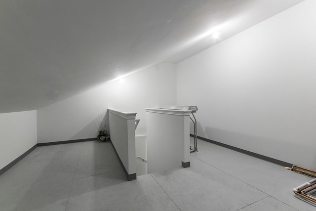 2164 Waterbury Ln W Unit 2164, Sycamore, IL 60178 - additional living space featuring baseboards and vaulted ceiling