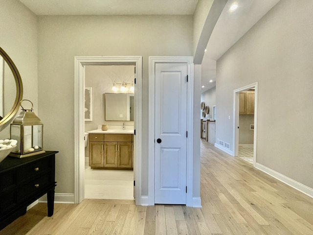 LOTT315929 Prairie View Ct, New Lenox, IL 60451 - corridor featuring light wood-style floors, a sink, and baseboards