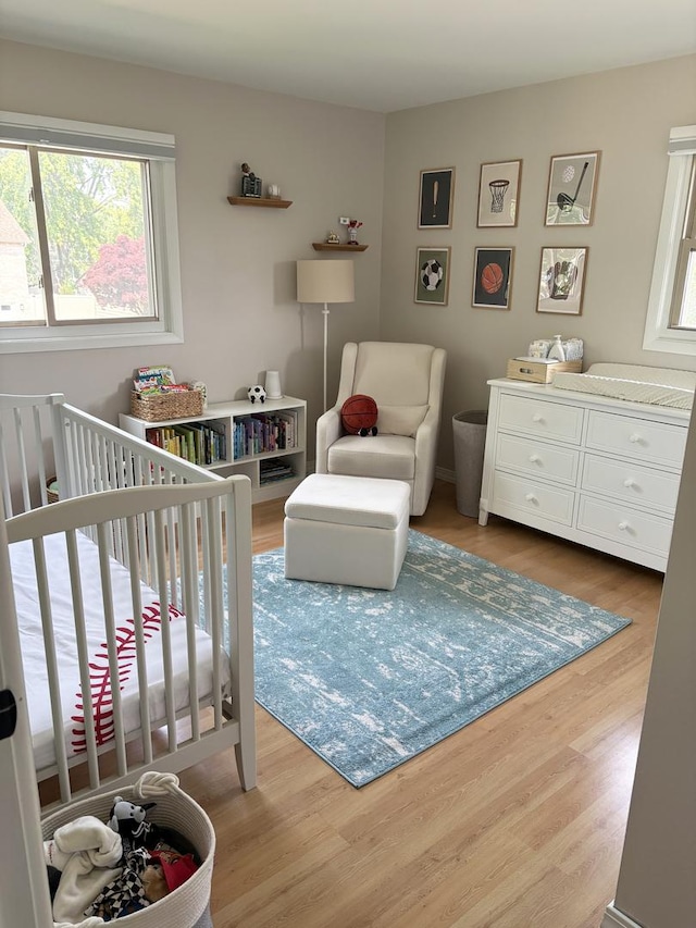 1487 Kathleen Way, Elk Grove Village, IL 60007 - bedroom with a crib and wood finished floors