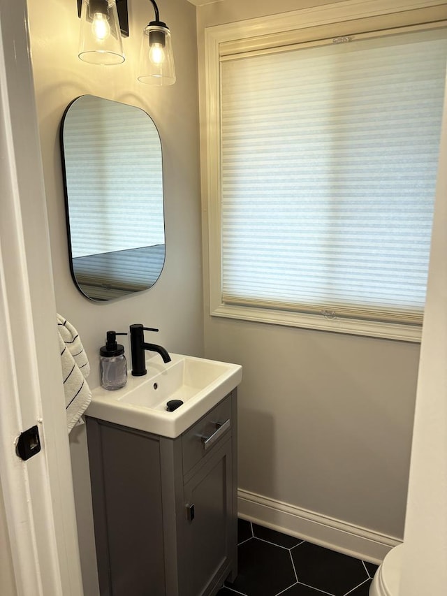 1487 Kathleen Way, Elk Grove Village, IL 60007 - half bathroom with vanity and tile patterned floors