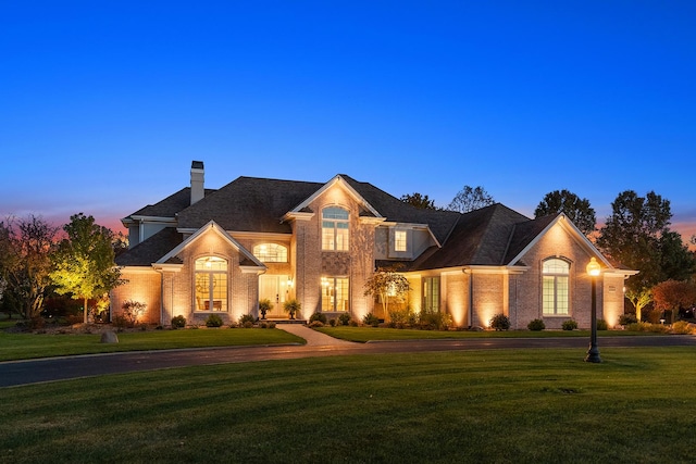 12000 W Donegal Ln, New Lenox, IL 60451 - view of front of property with a lawn, brick siding, and a chimney