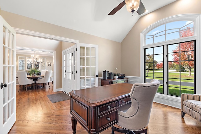 12000 W Donegal Ln, New Lenox, IL 60451 - home office with french doors, ceiling fan, a chandelier, lofted ceiling, and light wood-style flooring
