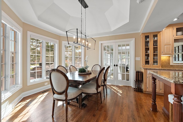 12000 W Donegal Ln, New Lenox, IL 60451 - dining space with a tray ceiling, french doors, dark wood-style floors, a chandelier, and crown molding