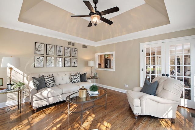 12000 W Donegal Ln, New Lenox, IL 60451 - living area featuring a raised ceiling, ceiling fan, french doors, wood finished floors, and ornamental molding