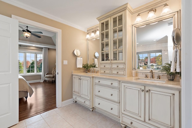 12000 W Donegal Ln, New Lenox, IL 60451 - bar area featuring light tile patterned floors, ceiling fan, and crown molding