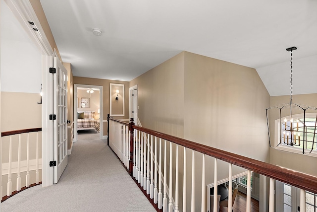 12000 W Donegal Ln, New Lenox, IL 60451 - hallway featuring a chandelier and carpet flooring