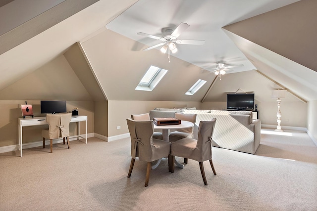 12000 W Donegal Ln, New Lenox, IL 60451 - dining space featuring light colored carpet, a skylight, ceiling fan, a desk, and vaulted ceiling