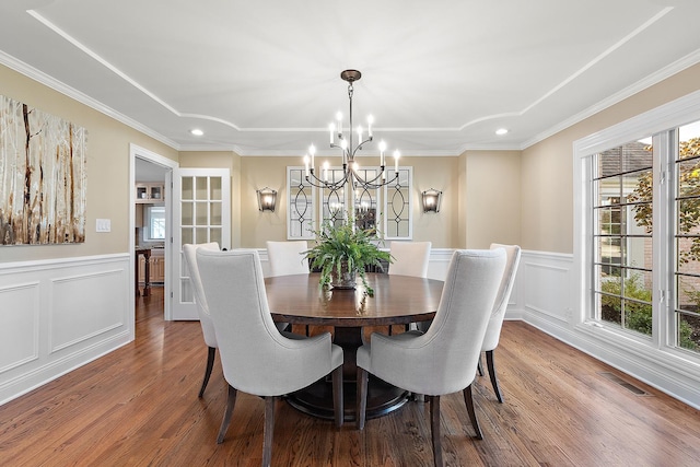 12000 W Donegal Ln, New Lenox, IL 60451 - dining space featuring a chandelier, recessed lighting, wood finished floors, wainscoting, and a decorative wall