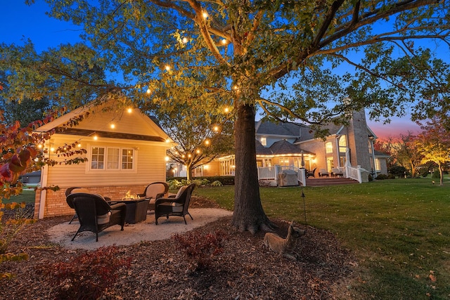 12000 W Donegal Ln, New Lenox, IL 60451 - view of grassy yard with a fire pit and a patio