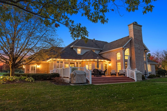 12000 W Donegal Ln, New Lenox, IL 60451 - back of house with brick siding, a yard, a chimney, and a deck
