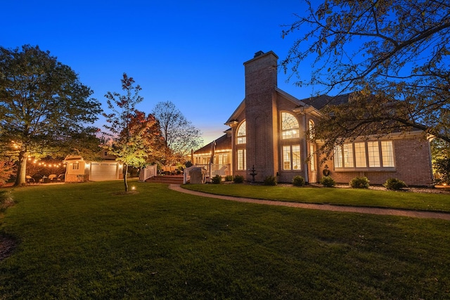 12000 W Donegal Ln, New Lenox, IL 60451 - view of home's exterior with a lawn and a chimney