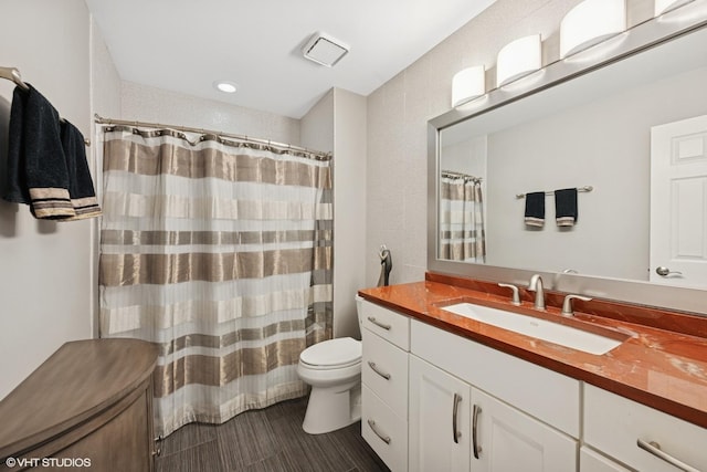 640 Yardley Ln, Hoffman Estates, IL 60169 - bathroom featuring toilet, vanity, and a shower with shower curtain