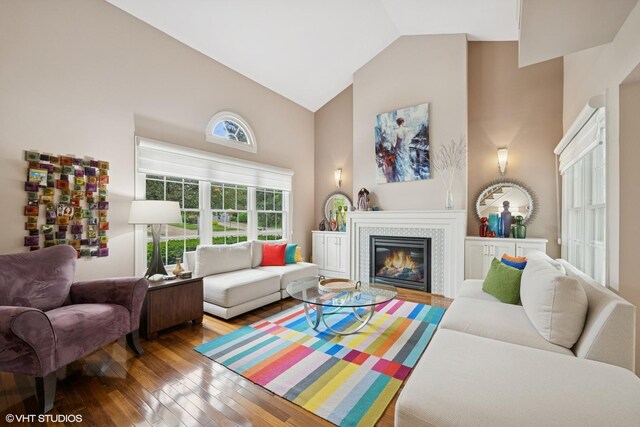 640 Yardley Ln, Hoffman Estates, IL 60169 - living area with hardwood / wood-style floors, high vaulted ceiling, and a fireplace