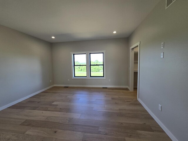 17-95 Lake Carroll Blvd, Lake Carroll, IL 61046 - unfurnished bedroom with recessed lighting, wood finished floors, and baseboards