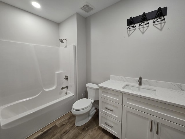 17-95 Lake Carroll Blvd, Lake Carroll, IL 61046 - bathroom with vanity, toilet, wood finished floors, bathing tub / shower combination, and recessed lighting