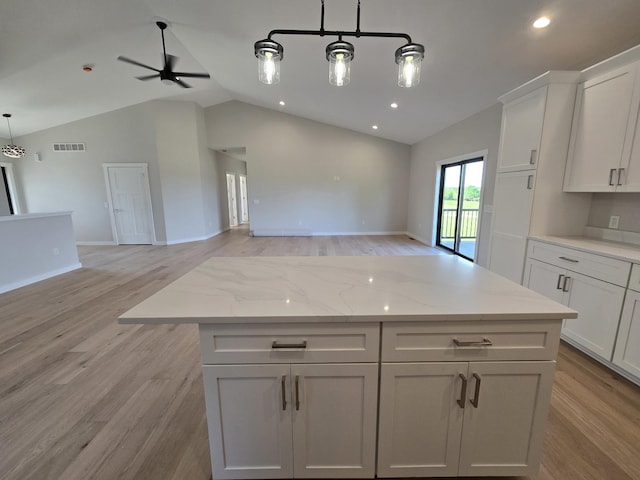 17-95 Lake Carroll Blvd, Lake Carroll, IL 61046 - kitchen with open floor plan, light wood-type flooring, a center island, high vaulted ceiling, and recessed lighting