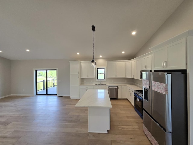 17-95 Lake Carroll Blvd, Lake Carroll, IL 61046 - kitchen featuring stainless steel appliances, a sink, a center island, plenty of natural light, and recessed lighting