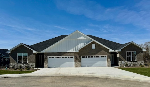 15959 Prairie View Ct Unit T6, New Lenox, IL 60451 - view of front of house featuring board and batten siding, a garage, stone siding, and driveway